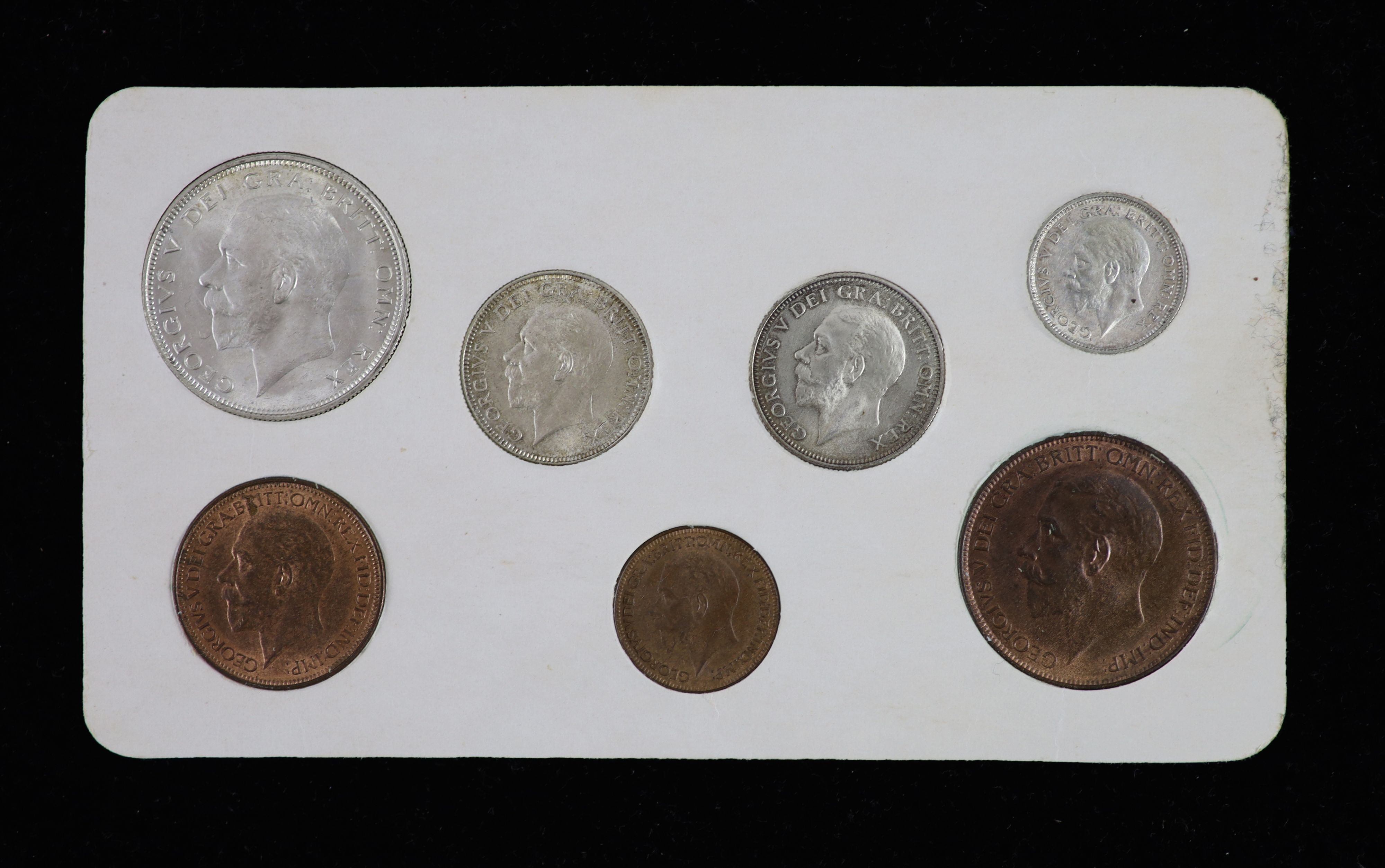 George V specimen set of seven coins, 1927, comprising 3rd coinage, halfcrown and shilling, 3rd coinage, and 4th coinage shilling, sixpence, all cleaned good VF/EF, the penny, halfpenny and farthing, toned and lustrous U
